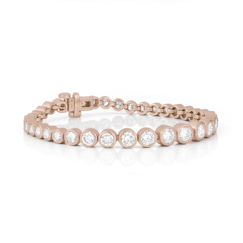 side view, showing the gradation of bezel diameters, bracelet center to clasp<span class='visuallyhidden'>; 323-404-2959 for shop help.</span>
